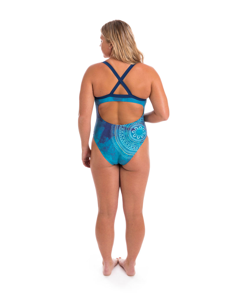 This style has good coverage in the front and back and has a fuller bottom. The Xover straps are made with wide binding and the wide back strap make for a comfortable and supportive style for all sizes.